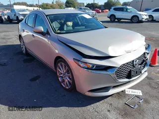 2023 Mazda 3 S Select with VIN 3MZBPABM2PM377556, listed as a IAAI auction lot 41270123 with 14,513 mi miles and . Bid and sale history available at DreamBid. Image 1.