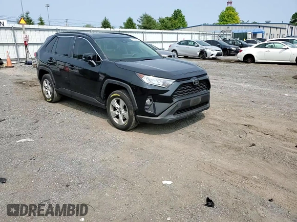 2019 Toyota RAV4 XLE with VIN JTMP1RFV8KJ001784, listed as a Copart auction lot 59109235 with 98,858 mi miles and Salvage title. Bid and sale history available at DreamBid. Image 14.