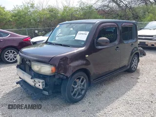 2009 Nissan Cube SL z VIN JN8AZ28R39T111263, wystawiony jako IAAI lot #42050350 z przebiegiem 253 666 mil mil oraz . Historia ofert i sprzedaży dostępna na DreamBid. Obrazek 2.