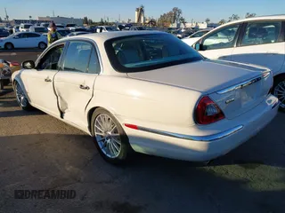 2007 Jaguar XJ with VIN SAJWA71B17SH12746, listed as a IAAI auction lot 41401422 with 99,735 mi miles. Bid and sale history available at carsss.com. Image 3.