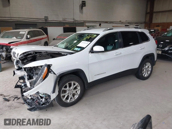 2014 Jeep Cherokee Altitude with VIN 1C4PJMCB7EW186432, listed as a IAAI auction lot 42076018 with 150,186 mi miles and . Bid and sale history available at DreamBid. Image 2.