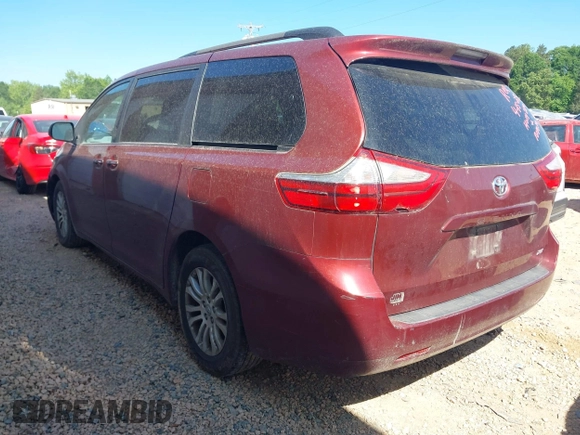 2015 Toyota Sienna XLE with VIN 5TDYK3DC3FS666438, listed as a IAAI auction lot 42117980 with 121,084 mi miles and . Bid and sale history available at DreamBid. Image 3.
