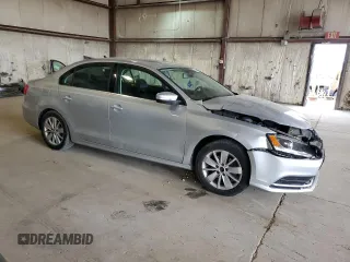2015 Volkswagen Jetta SE with VIN 3VWD07AJ4FM404097, listed as a Copart auction lot 55054165 with 107,803 mi miles and Salvage title. Bid and sale history available at DreamBid. Image 4.