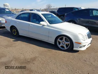 2009 Mercedes-Benz E-Class Luxury 3.5L with VIN WDBUF87X99B425282, listed as a IAAI auction lot 42060522 with 212,614 mi miles. Bid and sale history available at carsss.com. Image 1.