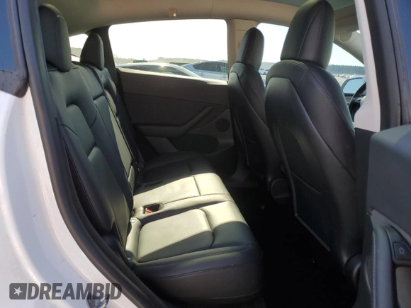 2023 Tesla Model Y Performance with VIN 7SAYGDEF4PF665873, listed as a Copart auction lot 49620705 with 39,239 mi miles and Salvage Title. Bid and sale history available at DreamBid. Image 10.
