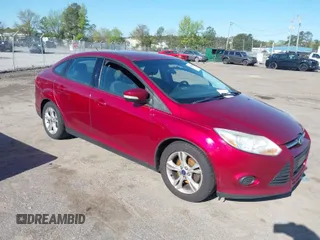2014 Ford Focus SE with VIN 1FADP3F27EL202224, listed as a IAAI auction lot 42067644 with 174,674 mi miles. Bid and sale history available at carsss.com. Image 1.