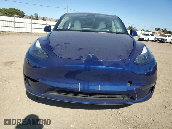 2024 Tesla Model Y Long Range with VIN 7SAYGDEEXRF983989, listed as a Copart auction lot 64035155 with 12,137 mi miles and Salvage title. Bid and sale history available at DreamBid. Image 5.