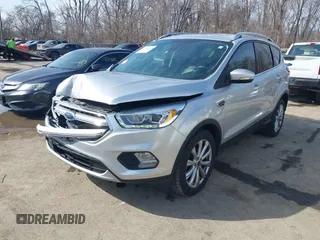 2017 Ford Escape Titanium with VIN 1FMCU0JD3HUB13234, listed as a IAAI auction lot 41760944 with 113,361 mi miles. Bid and sale history available at carsss.com. Image 17.
