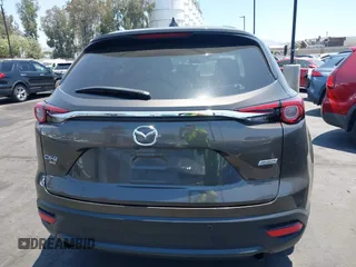 2017 Mazda CX-9 Touring with VIN JM3TCBCY1H0131233, listed as a IAAI auction lot 42490137 with 84,216 mi miles and . Bid and sale history available at DreamBid. Image 16.