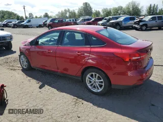 2016 Ford Focus SE with VIN 1FADP3F28GL221688, listed as a Copart auction lot 61846645 with 82,934 mi miles and Salvage title. Bid and sale history available at DreamBid. Image 2.