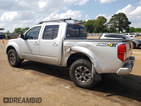 2016 Nissan Frontier Pro-4X with VIN 1N6AD0EV0GN797437, listed as a Copart auction lot 54203245 with 131,021 mi miles and Salvage title. Bid and sale history available at DreamBid. Image 2.