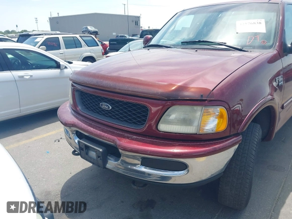 1998 Ford F-150 with VIN 1FTZX18W9WKC09638, listed as a IAAI auction lot 42576838 with 140,714 mi miles and . Bid and sale history available at DreamBid. Image 6.