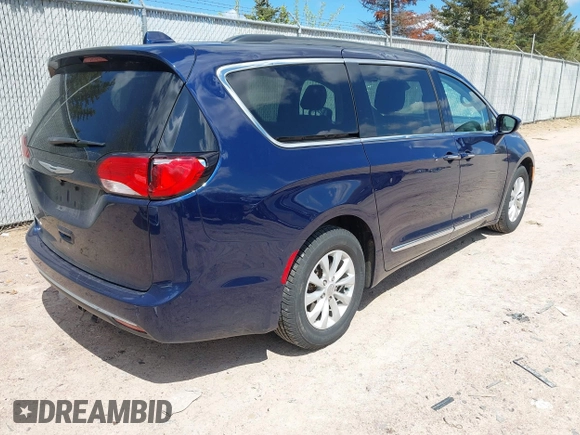 2017 Chrysler Pacifica Touring L with VIN 2C4RC1BG7HR514864, listed as a IAAI auction lot 42187845 with 86,774 mi miles and . Bid and sale history available at DreamBid. Image 4.