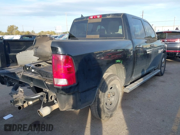 2014 Ram 1500 Big Horn with VIN 1C6RR6LT8ES403684, listed as a IAAI auction lot 41076858 with 130,527 mi miles and . Bid and sale history available at DreamBid. Image 4.