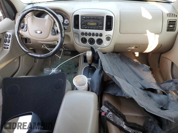 2005 Ford Escape Limited with VIN 1FMYU94195KB35872, listed as a Copart auction lot 63285755 with 145,638 mi miles and Salvage title. Bid and sale history available at DreamBid. Image 8.