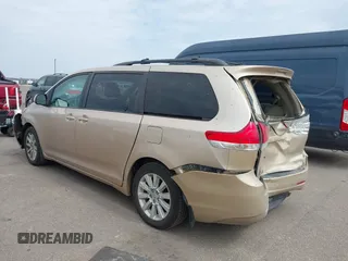 2013 Toyota Sienna XLE with VIN 5TDDK3DC4DS055796, listed as a IAAI auction lot 41993530 with 256,735 mi miles and . Bid and sale history available at DreamBid. Image 3.