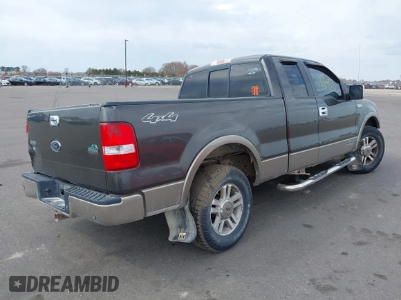 2005 Ford F-150 XLT with VIN 1FTPX14515NA43732, listed as a IAAI auction lot 41901453 with 216,729 mi miles. Bid and sale history available at carsss.com. Image 4.