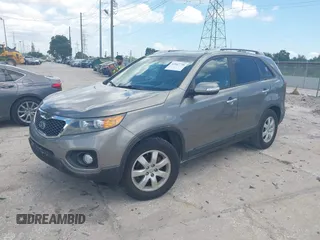 2013 Kia Sorento LX with VIN 5XYKT3A62DG322174, listed as a IAAI auction lot 42647736 with 92,389 mi miles and . Bid and sale history available at DreamBid. Image 2.