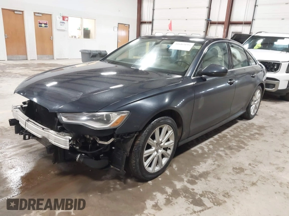 2016 Audi A6 2.0T Premium Plus with VIN WAUGFAFC4GN052293, listed as a IAAI auction lot 41683195 with 85,312 mi miles. Bid and sale history available at carsss.com. Image 2.