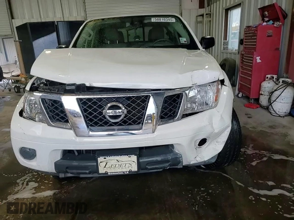 2019 Nissan Frontier SV with VIN 1N6AD0ER7KN712895, listed as a Copart auction lot 58810345 with 77,941 mi miles and Salvage title. Bid and sale history available at DreamBid. Image 13.