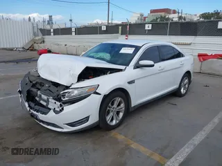 2013 Ford Taurus SEL with VIN 1FAHP2E81DG121759, listed as a IAAI auction lot 41939931 with 110,756 mi miles. Bid and sale history available at carsss.com. Image 2.