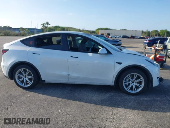 2021 Tesla Model Y Standard Range with VIN 5YJYGDED3MF103650, listed as a IAAI auction lot 41726278 with Not Provided miles and . Bid and sale history available at DreamBid. Image 12.