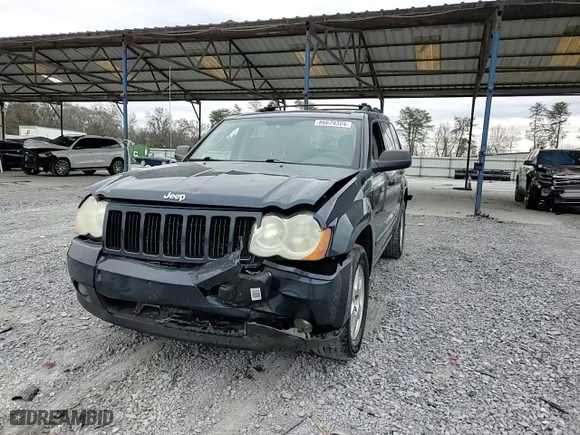 2009 Jeep Grand Cherokee Laredo with VIN 1J8HS48P79C532789, listed as a Copart auction lot 86679324 with 200,167 mi miles and Salvage Title. Bid and sale history available at carsss.com. Image 11.