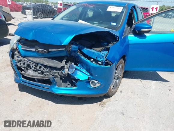 2014 Ford Focus SE with VIN 1FADP3K20EL383687, listed as a IAAI auction lot 42004089 with 127,374 mi miles. Bid and sale history available at carsss.com. Image 6.