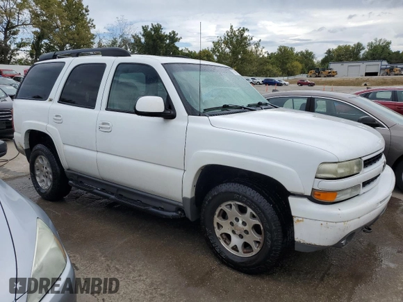 2003 Chevrolet Tahoe LT with VIN 1GNEK13Z33R175110, listed as a Copart auction lot 71407754 with 449,293 mi miles and Salvage Title. Bid and sale history available at carsss.com. Image 4.