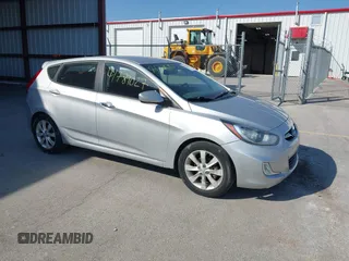 2012 Hyundai Accent SE with VIN KMHCU5AE0CU021092, listed as a IAAI auction lot 41789027 with 137,557 mi miles. Bid and sale history available at carsss.com. Image 1.