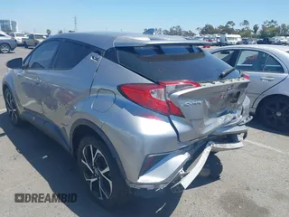 2018 Toyota C-HR XLE z VIN NMTKHMBX2JR057798, wystawiony jako IAAI lot #42327724 z przebiegiem 115 715 mil mil oraz . Historia ofert i sprzedaży dostępna na DreamBid. Obrazek 3.