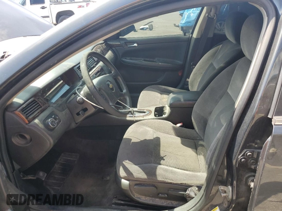 2015 Chevrolet Impala LS with VIN 2G1WA5E38F1165968, listed as a Copart auction lot 61467355 with 143,848 mi miles and Salvage title. Bid and sale history available at DreamBid. Image 7.