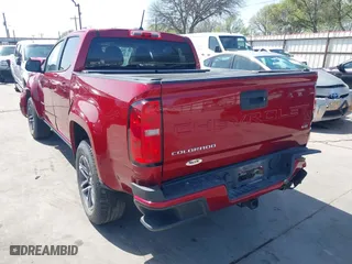 2021 Chevrolet Colorado 2WD Work Truck with VIN 1GCGSBEN1M1101105, listed as a IAAI auction lot 41827728 with 75,064 mi miles. Bid and sale history available at carsss.com. Image 3.