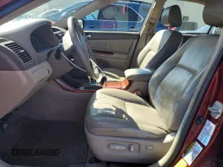 2004 Toyota Camry LE with VIN 4T1BE30KX4U297754, listed as a Copart auction lot 50795425 with 184,152 mi miles and Salvage Title. Bid and sale history available at DreamBid. Image 7.