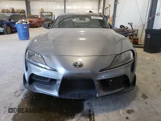 2022 Toyota GR Supra 3.0 with VIN WZ1DB0C03NW052512, listed as a Copart auction lot 86583474 with 5,774 mi miles and Salvage Title. Bid and sale history available at carsss.com. Image 5.