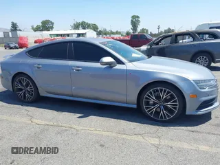 2018 Audi A7 Premium Plus z VIN WAUW3AFC1JN026763, wystawiony jako IAAI lot #42359297 z przebiegiem 108 937 mil mil oraz . Historia ofert i sprzedaży dostępna na DreamBid. Obrazek 1.