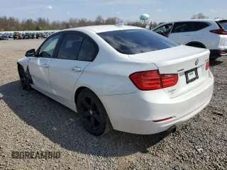 2013 BMW 3 Series 320i xDrive with VIN WBA3C3C5XDF980169, listed as a Copart auction lot 52717675 with 119,297 mi miles and Salvage title. Bid and sale history available at DreamBid. Image 2.