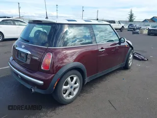 2003 MINI Hardtop with VIN WMWRC33493TC45557, listed as a IAAI auction lot 41868476 with 114,848 mi miles and . Bid and sale history available at DreamBid. Image 4.
