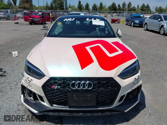 2018 Audi RS 5 z VIN WUAPWAF55JA903152, wystawiony jako IAAI lot #42193996 z przebiegiem 95 730 mil mil oraz . Historia ofert i sprzedaży dostępna na DreamBid. Obrazek 12.