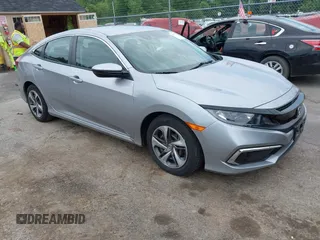 2020 Honda Civic LX with VIN 2HGFC2F60LH550941, listed as a IAAI auction lot 42477750 with 26,667 mi miles and . Bid and sale history available at DreamBid. Image 1.