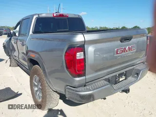 2024 GMC Canyon 4WD AT4X with VIN 1GTP6EEK6R1250127, listed as a IAAI auction lot 41823196 with 1,574 mi miles and . Bid and sale history available at carsss.com. Image 3.