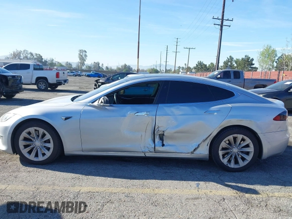 2017 Tesla Model S 60 with VIN 5YJSA1E12HF195741, listed as a IAAI auction lot 41861327 with 172,011 mi miles and . Bid and sale history available at DreamBid. Image 6.
