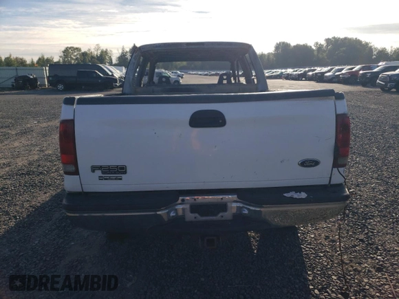 2000 Ford Super Duty F-250 XL with VIN 1FTNW21S9YEC44065, listed as a Copart auction lot 71174294 with 0 mi miles and Salvage Title. Bid and sale history available at carsss.com. Image 6.