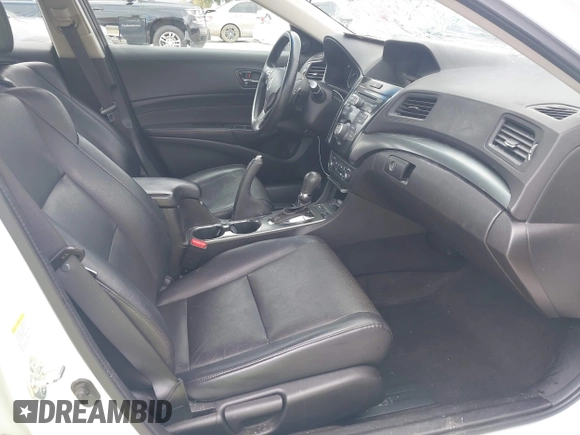 2014 Acura ILX with VIN 19VDE1F34EE000679, listed as a IAAI auction lot 41799014 with 136,514 mi miles. Bid and sale history available at carsss.com. Image 5.