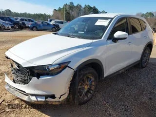 2019 Mazda CX-5 Sport with VIN JM3KFBBM0K0574255, listed as a IAAI auction lot 41661924 with 93,851 mi miles and . Bid and sale history available at DreamBid. Image 17.
