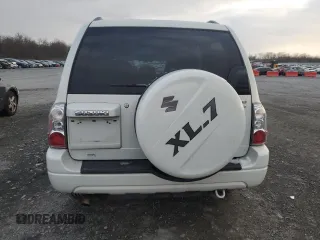 2004 Suzuki XL7 LX z VIN JS3TX92V544113433, wystawiony jako Copart lot #84066144 z przebiegiem 164 390 mil mil oraz Szkoda całkowita • Salvage title. Historia ofert i sprzedaży dostępna na DreamBid. Obrazek 6.