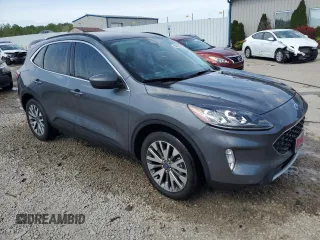 2021 Ford Escape Titanium Hybrid z VIN 1FMCU9DZ4MUA56645, wystawiony jako Copart lot #54059515 z przebiegiem 31 432 mil mil oraz Szkoda całkowita • Salvage title. Historia ofert i sprzedaży dostępna na DreamBid. Obrazek 4.