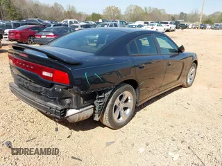 2014 Dodge Charger SE with VIN 2C3CDXBG4EH137969, listed as a IAAI auction lot 41909252 with 149,126 mi miles and . Bid and sale history available at carsss.com. Image 4.