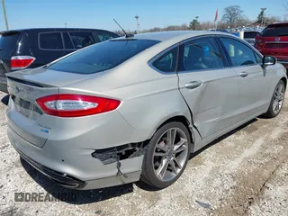 2015 Ford Fusion Titanium with VIN 3FA6P0D91FR236699, listed as a IAAI auction lot 41977478 with 203,394 mi miles. Bid and sale history available at carsss.com. Image 4.