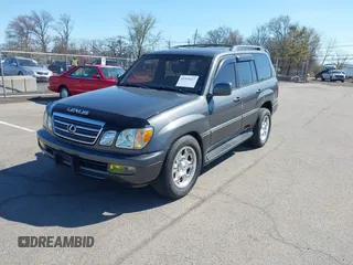 2003 Lexus LX with VIN JTJHT00W033531066, listed as a IAAI auction lot 41969617 with 209,710 mi miles. Bid and sale history available at carsss.com. Image 2.